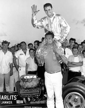 Buster Couch lifts up Don Garlits after Don ran Florida's first 200 mph pass. Photo by Jim Hill.jpg